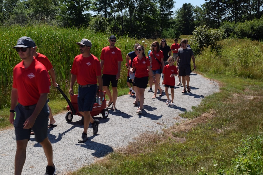 The extended Hofer family enjoying a tour of the sculptures along the Mary Hofer Walking Trail | Photo courtesy John Hofer